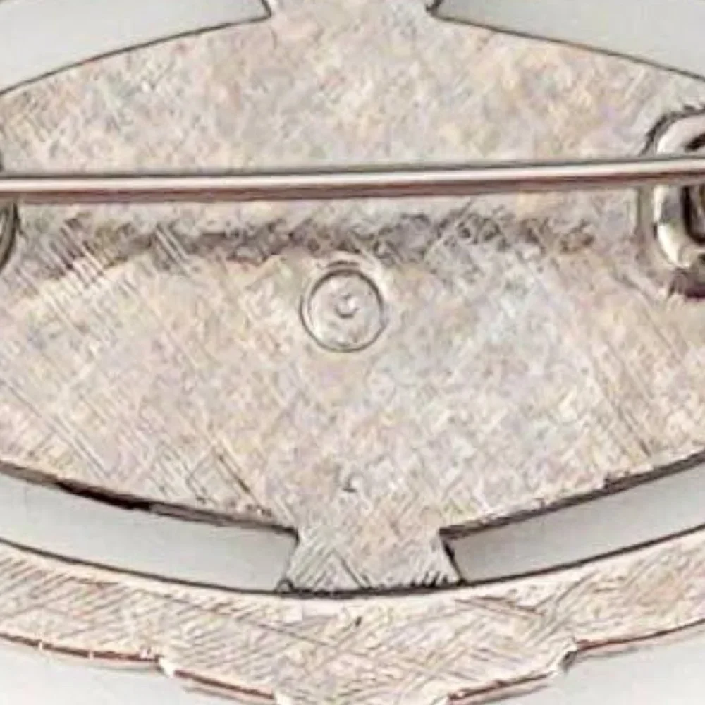 Textured silver and MOP brooch